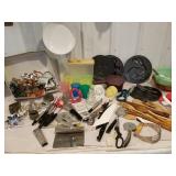 Cookie cutters, Tupperware, wooden spoons, frying