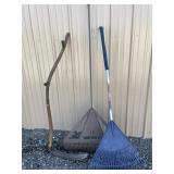 2 leaves rakes and a sickle