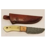 Damascus Knife w/ bone-like handle