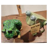 Two frogs, one is a bank