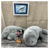 Stuffed manatees, picture, wooden carved box. In