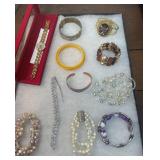 Lot of bracelets and Elizabeth Taylor watch in