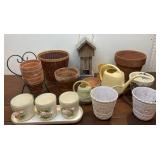 Box of planters, bird feeder, watering cans