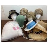 Lot of Hat/wig stands with wigs, hats and plush