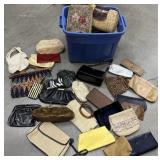 Blue tub of vintage purses - not all are perfect