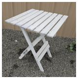 Folding patio table