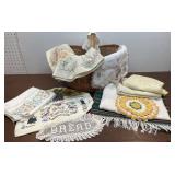 Basket of linens - runners, embroidered round
