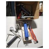 Grease guns and oil bottles