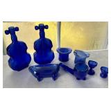 Cobalt violin bottles, top hats, pipe, souvenir