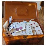 Plastic sewing box full of buttons