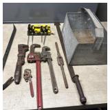 Pipe wrenches, wrecking bars, screwdrivers
