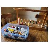 Tub & wooden display of thread