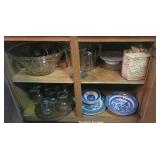 Contents of bottom cupboard next to washing