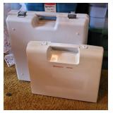 4 plastic cases - baby lock, Husqvarna and ?
