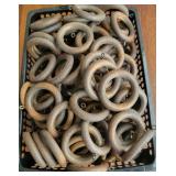 Basket of wooden curtain hooks.