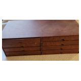 Case of collectors plates, by Thornton Utzo