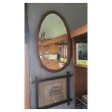 Oval beveled mirror and Eastlake frame