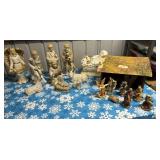 Tub full of two nativity sets and cookie jar