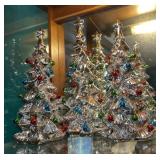 3 decorative silver Christmas trees