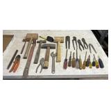 Box of tools, screwdrivers, pliers, hammers
