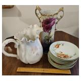pitcher, vase, 9 small plates
