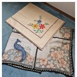 2 stunning embroidered tablecloths, 54X 56, 48X64