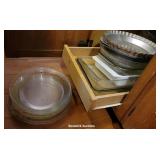 Contents cupboard left of sink - mostly pie