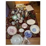 Purple tub of kitchenwares - coffee mugs,