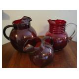 3 ruby glass pitchers