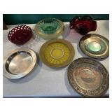 Stack of silver trays & colored glass serving