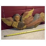 Heavy angel wood carving
