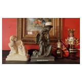 4 religious statues - on china cabinet