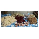 tub full of garland Christmas beads Santas,