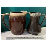 2 brown McCoy(?) pitchers