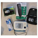 Garmin GPS, haircutting clippers, thermometer,