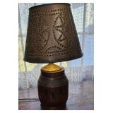 Wagon wheel hub lamp with pierced copper shade