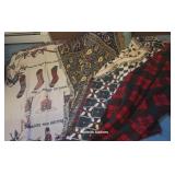 4 Christmas throws in blue bag