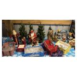 tub of Christmas trees, resin, statues, garland,