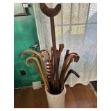 Pile of walking sticks and crutch