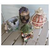 Resign and metal yard art