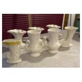 white McCoy vases and planters