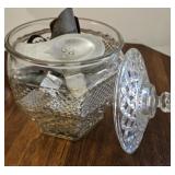 Cookie jar filled with cookie cutters