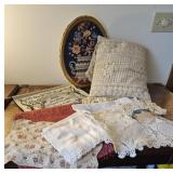 Lot of wall hangings, runner, doilies, pillow