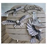 Tin eagles, light house