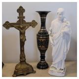 Brass crucifix, vase, and alabaster statue
