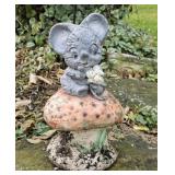 Concrete mouse on a mushroom