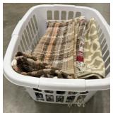 Basket of clean throw rugs