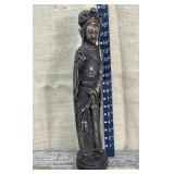 Intricately carved wooden statue