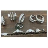 16 pretty rings  not sterling. Various sizes,