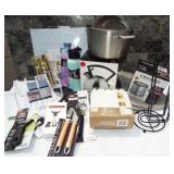 Bin of new kitchen items. Includes all items